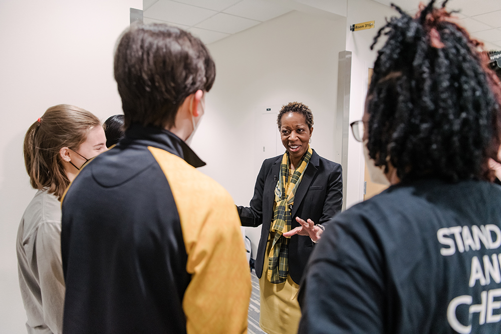 Dr. Ashby talks with students